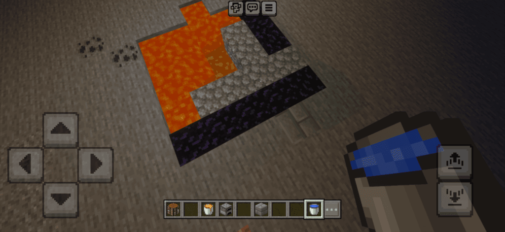 Creating obsidian by pouring water over a lava source in Minecraft