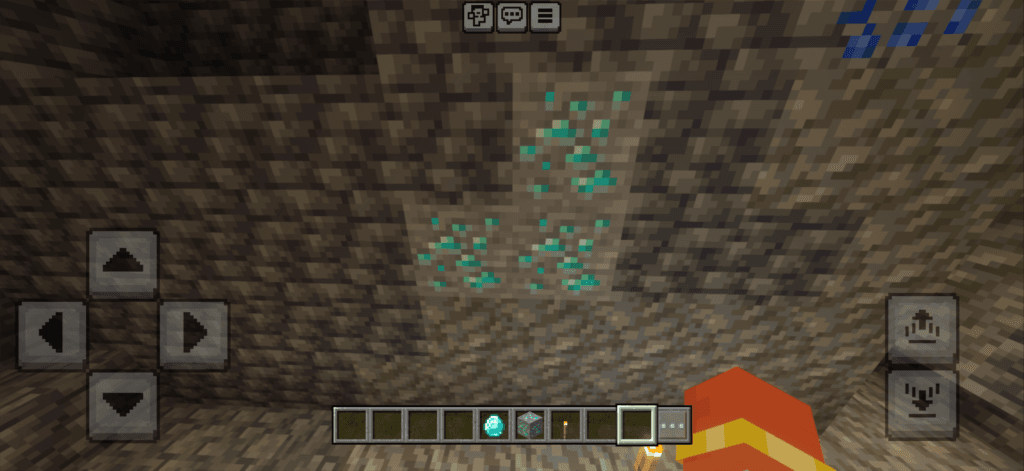 Diamond ore found deep underground in Minecraft