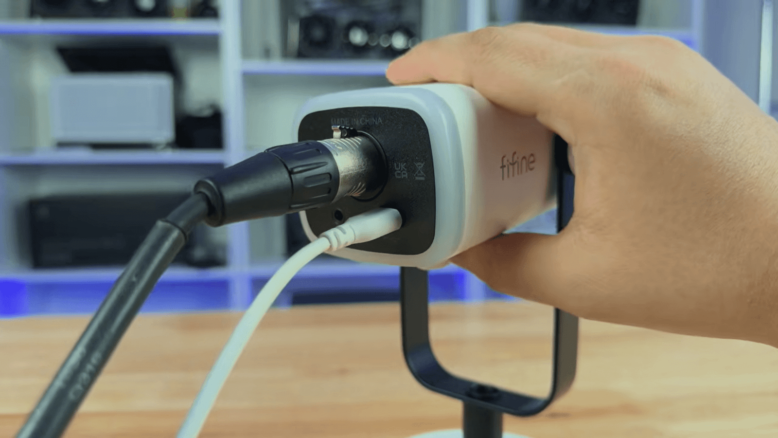 Connect an XLR cable to the AM8.